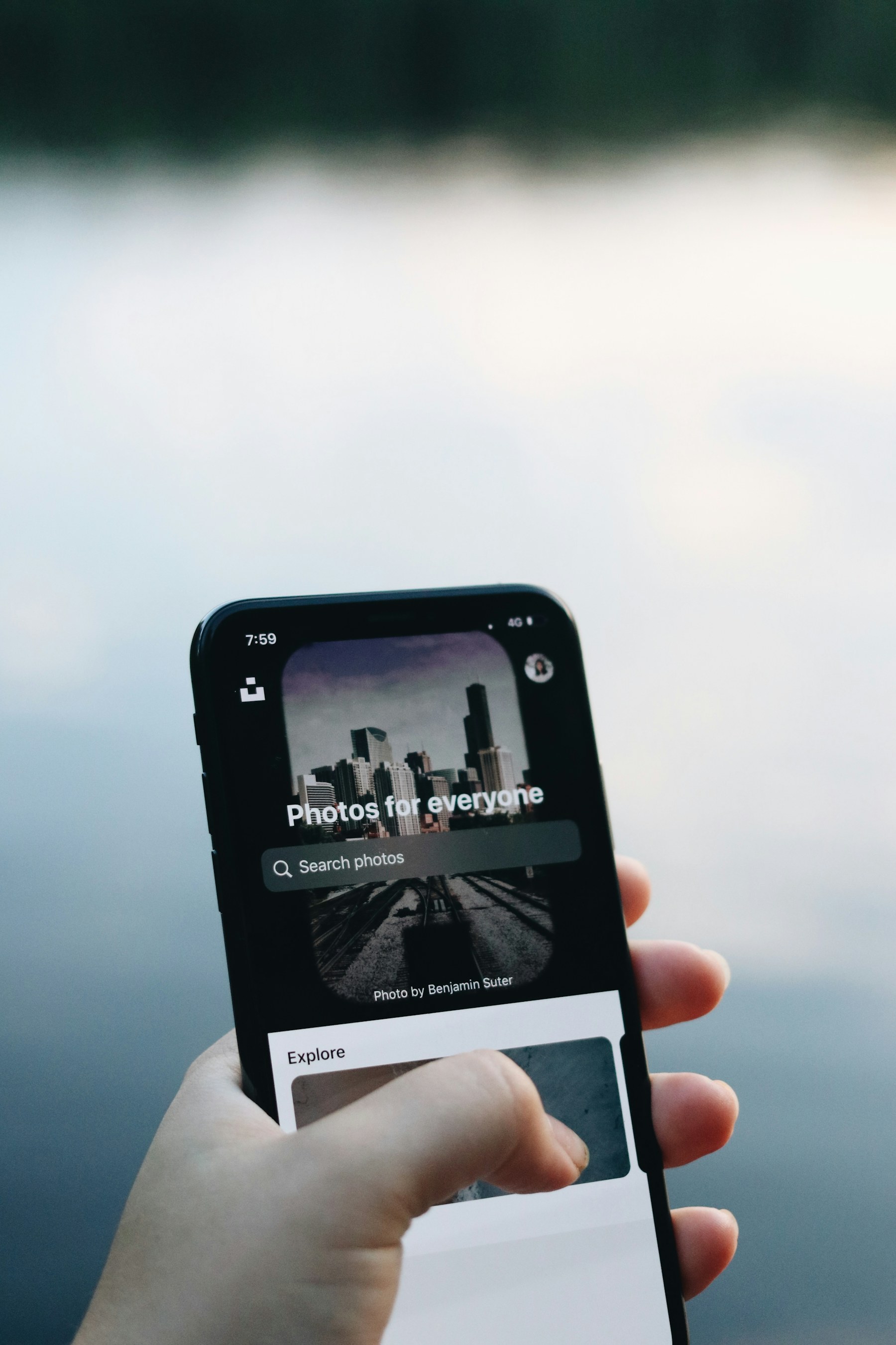 A person scrolling through a digital profile on a smartphone